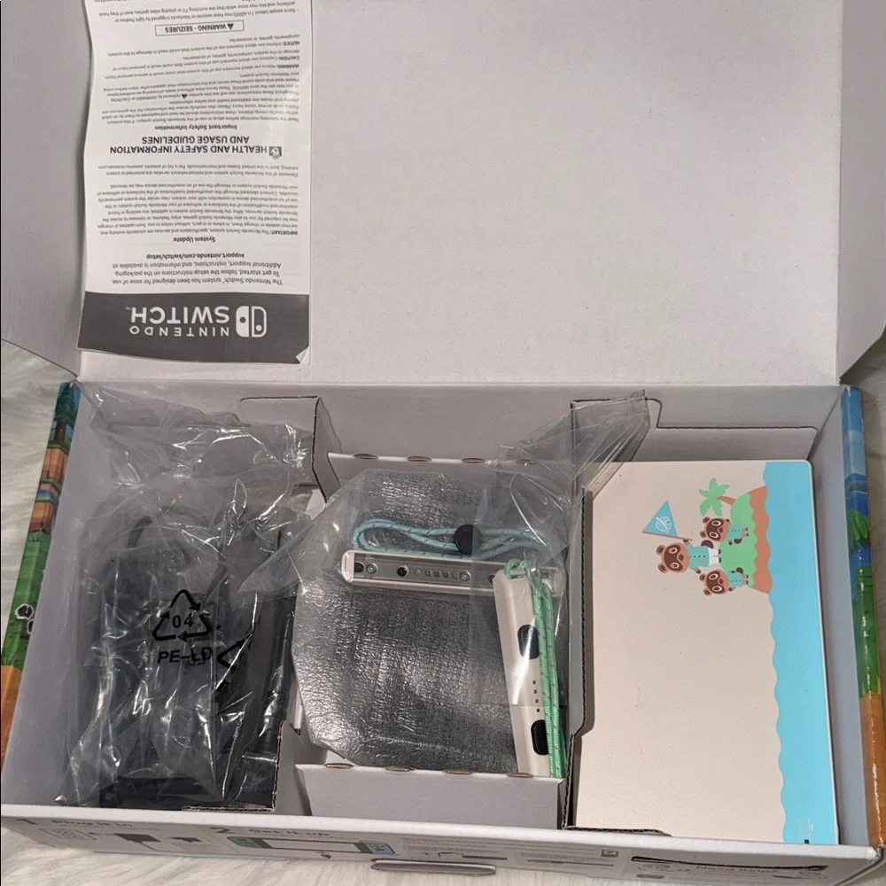 Nintendo Switch Animal Crossing Edition with Blue and Green Joy-Cons